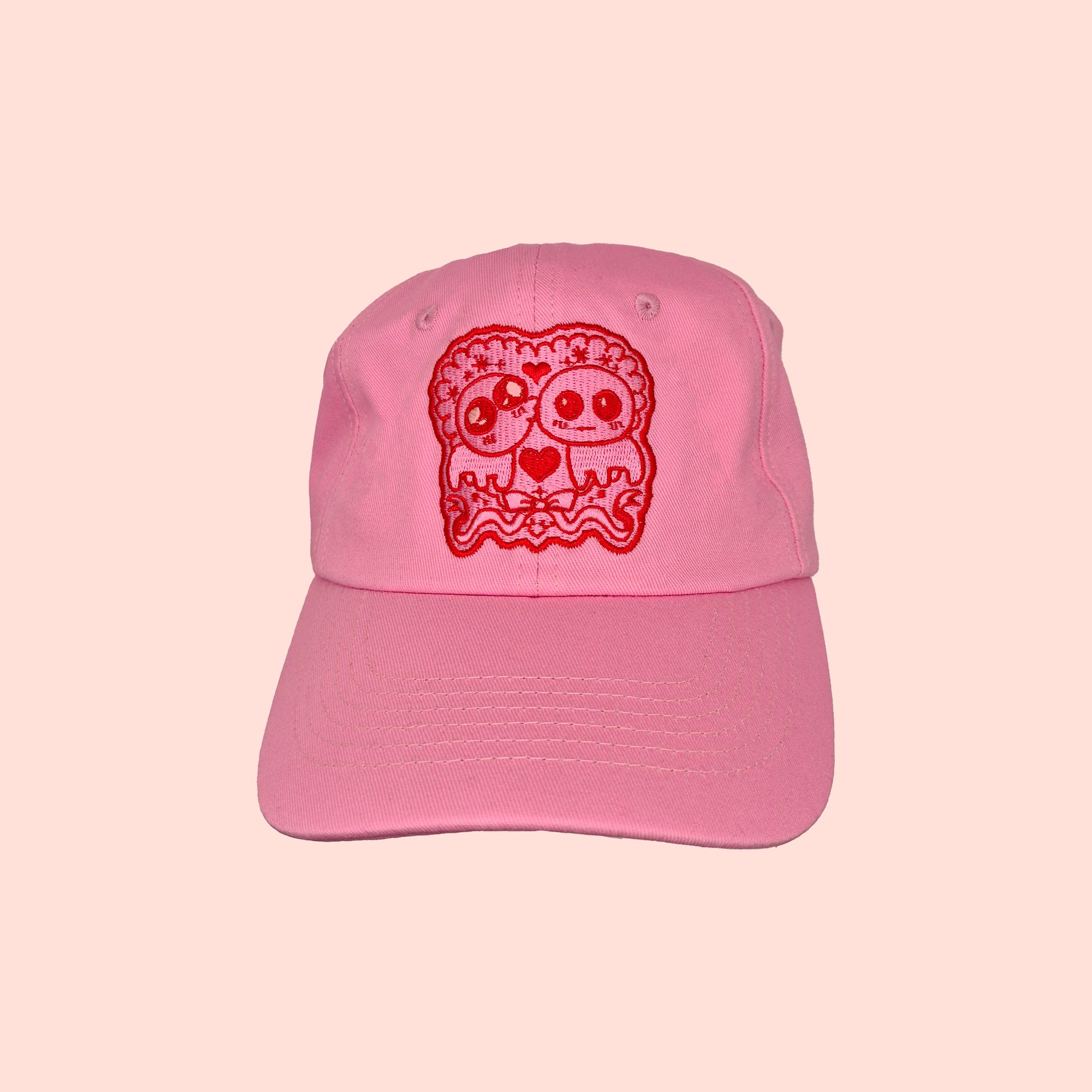 Kissing creatures hat
